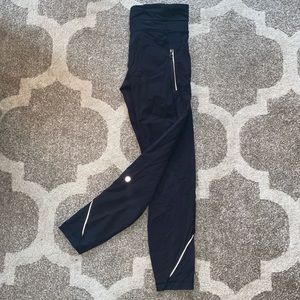 Lululemon size 6 leggings ! Reflective detail and logo at the back of the leg.